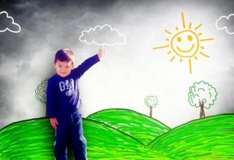 happy student drawing a sunny landscape