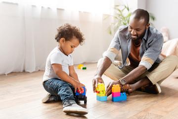 dad playing with child